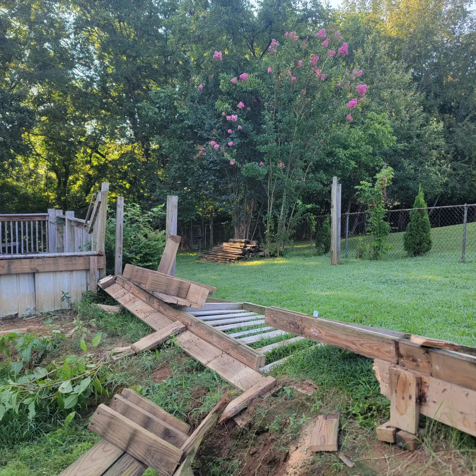 Backyard deck demolition debris