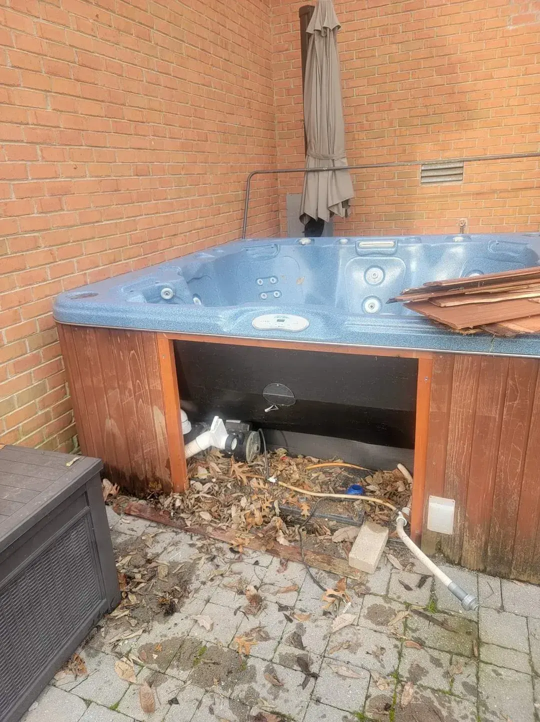 Old hot tub ready for removal