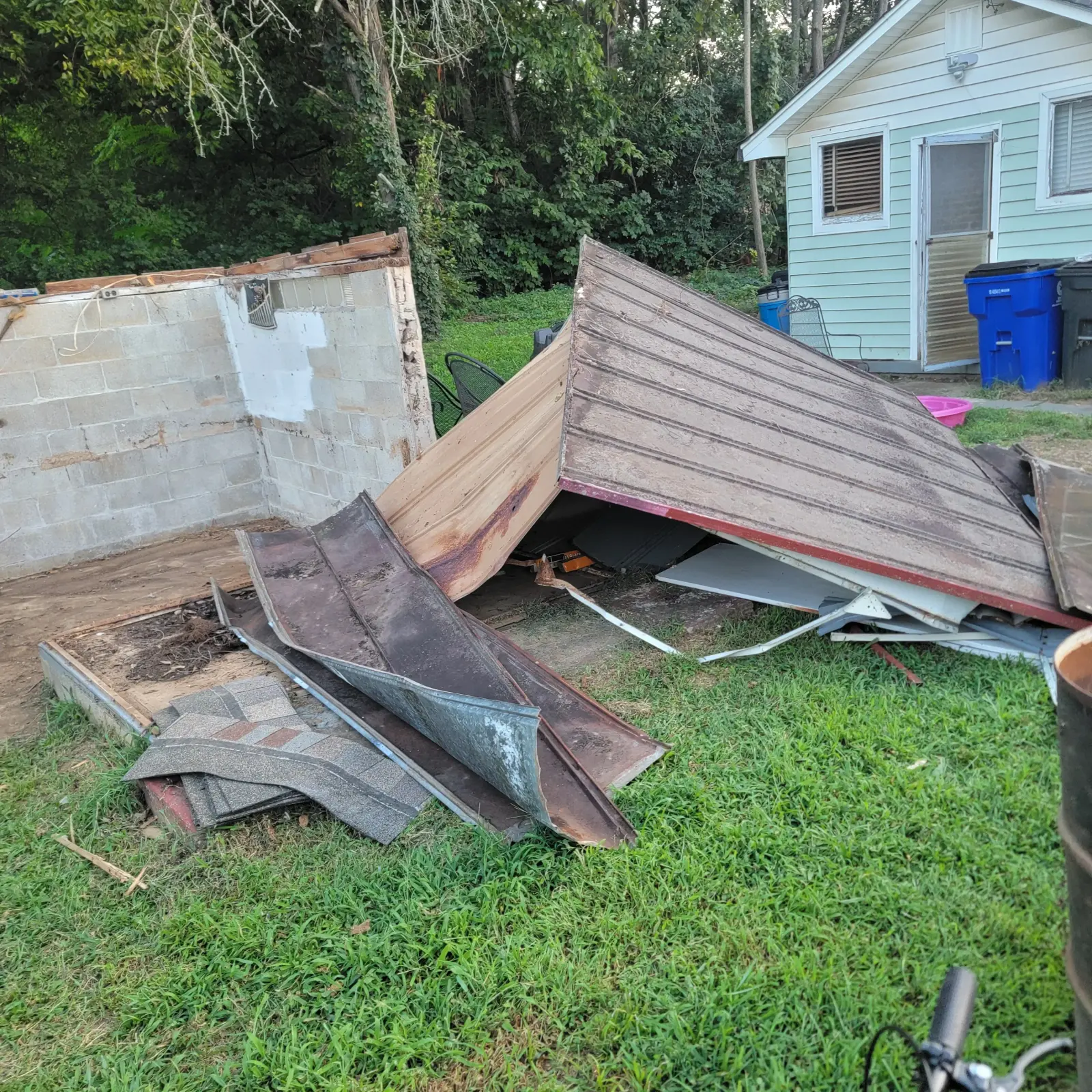 Shed demolition debris ready for hauling in Franklin, TN